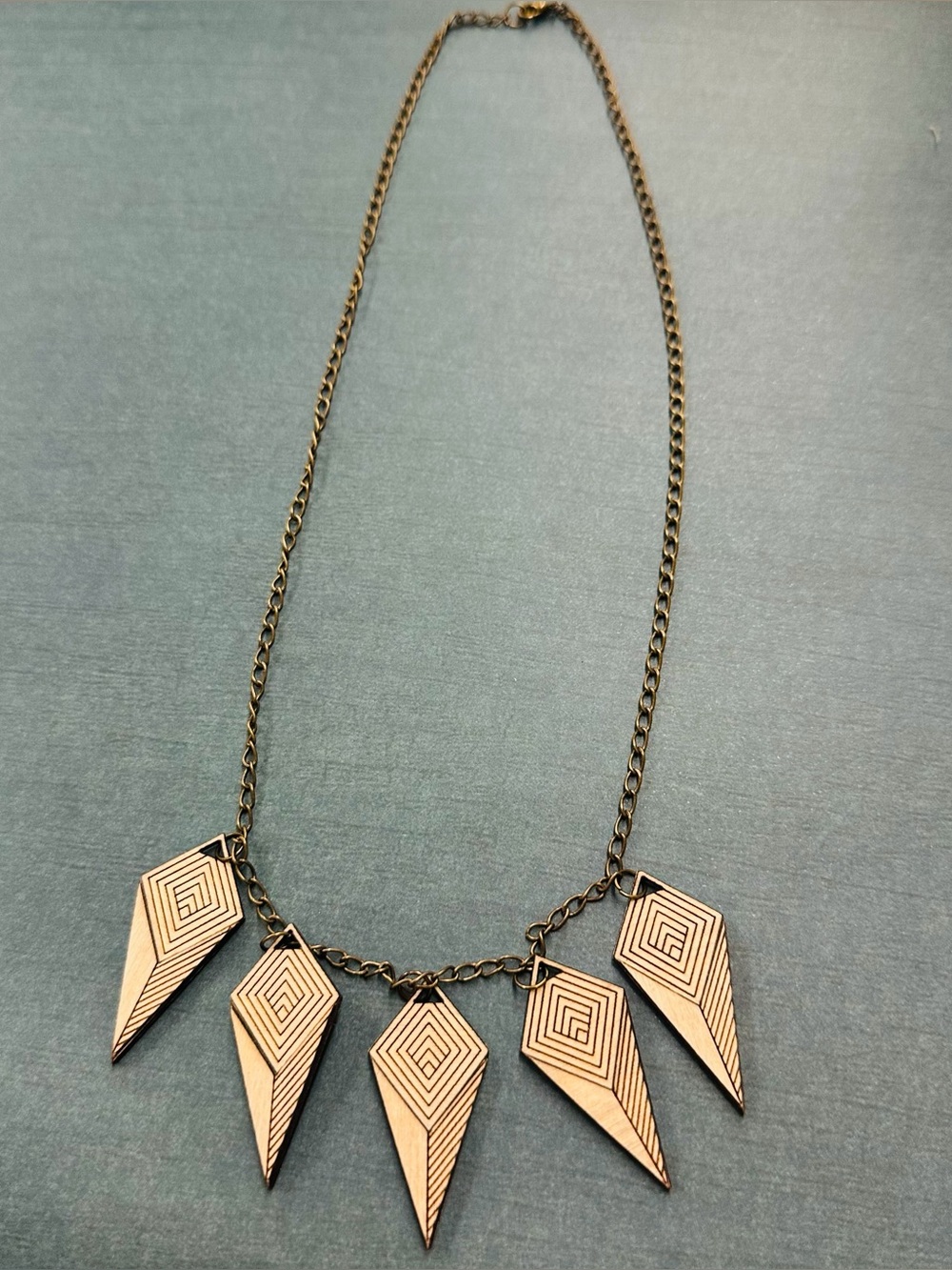 Evil Brass Wood Optical Illusion Geometric Necklace B10